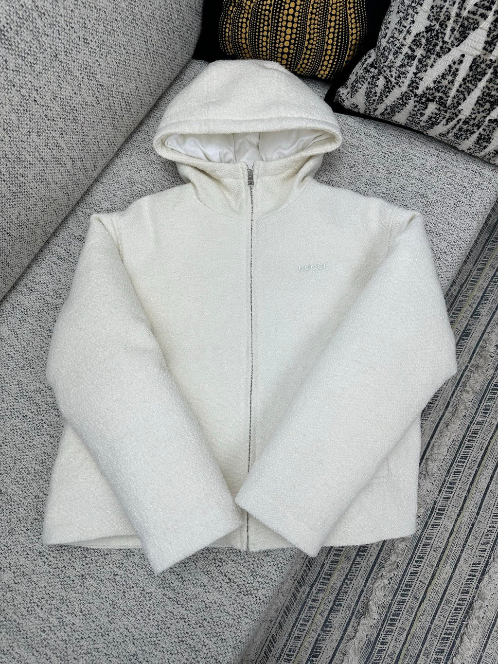 Off-white zip-up hoodie with hood and full front zipper