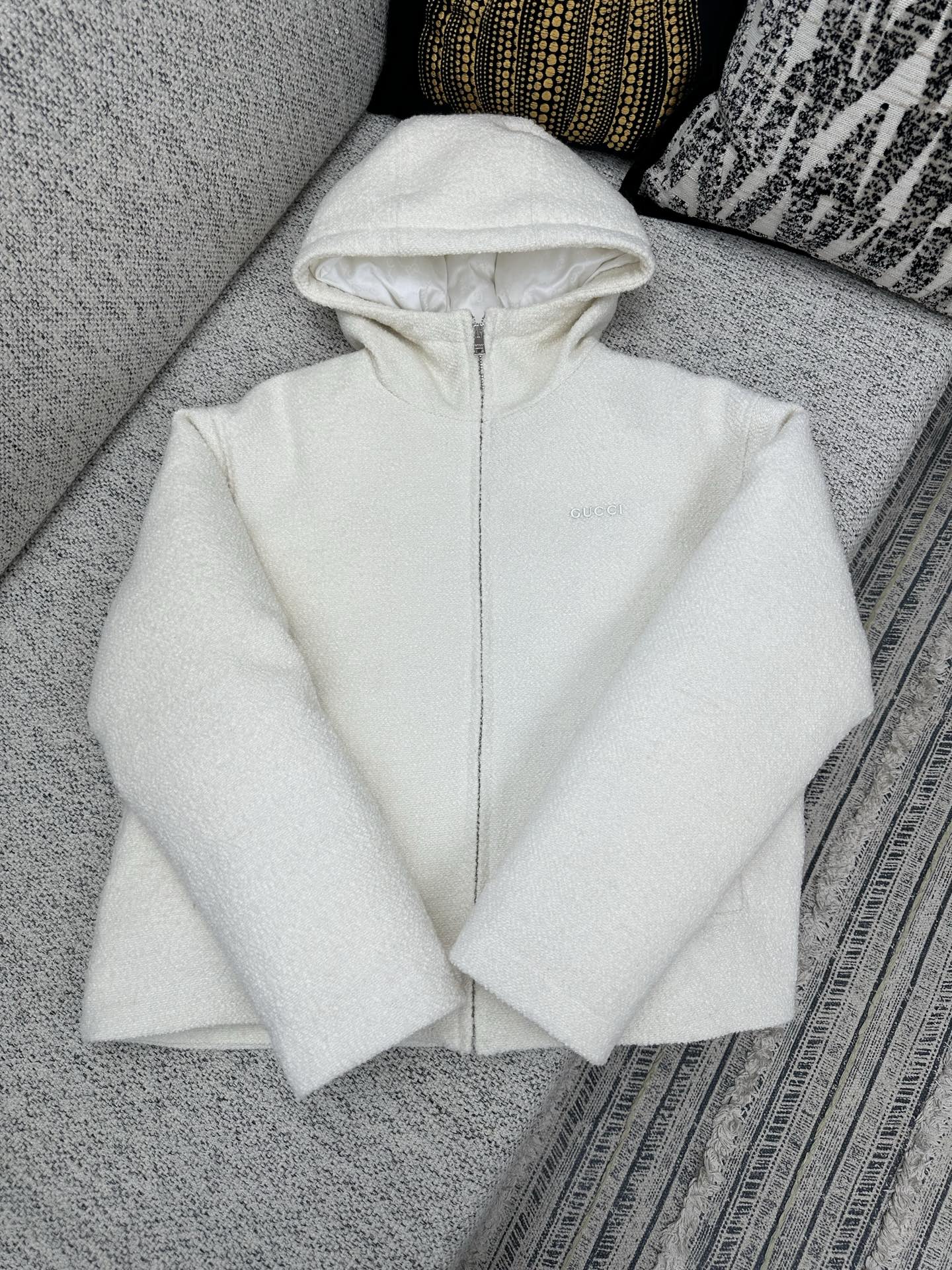 Off-white zip-up hoodie with hood and full front zipper