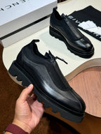 Givenchy black leather loafers with side strap and textured upper, chunky sole