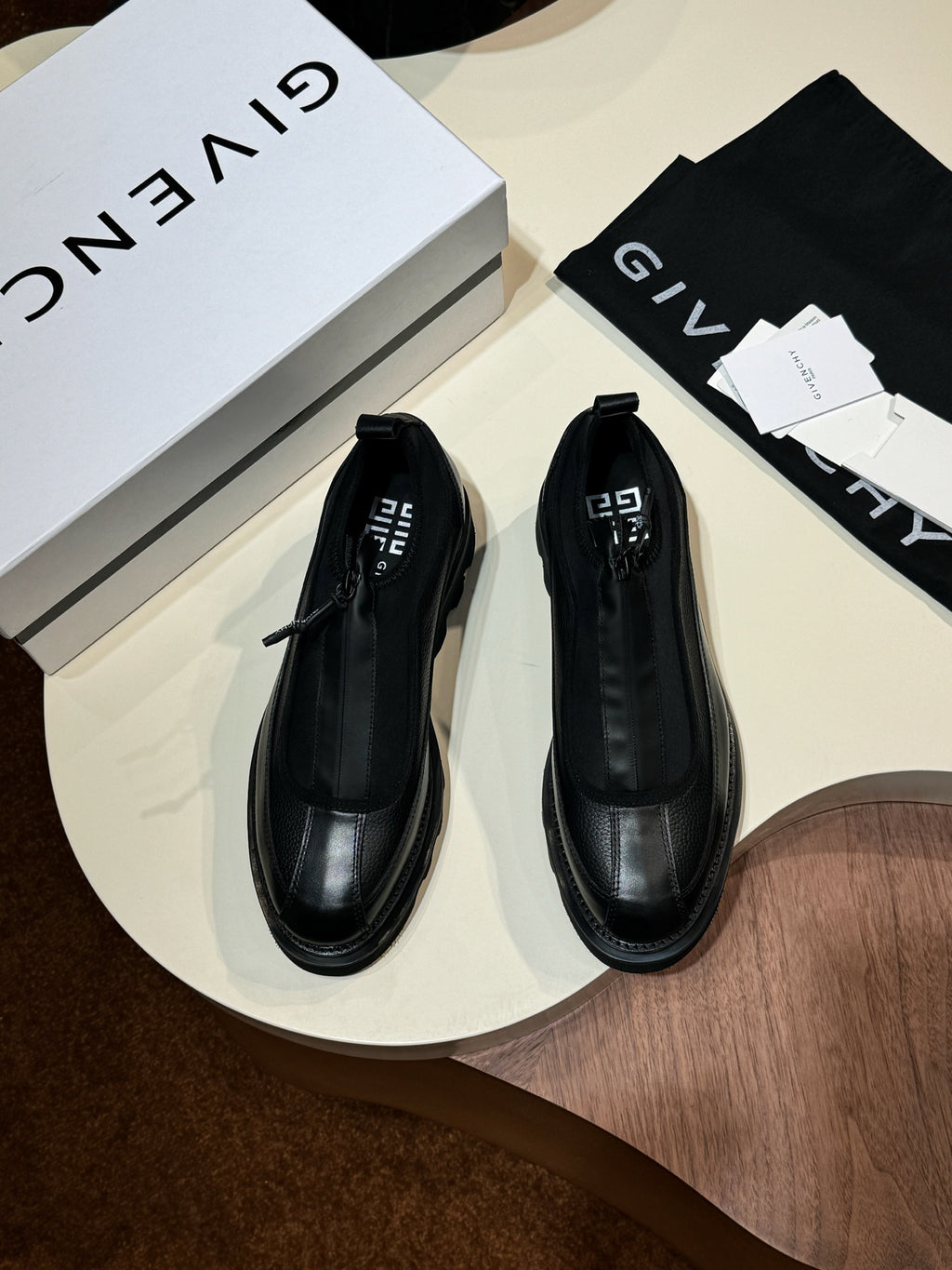Givenchy black leather loafers with pull tab and stitched upper, lace-up front