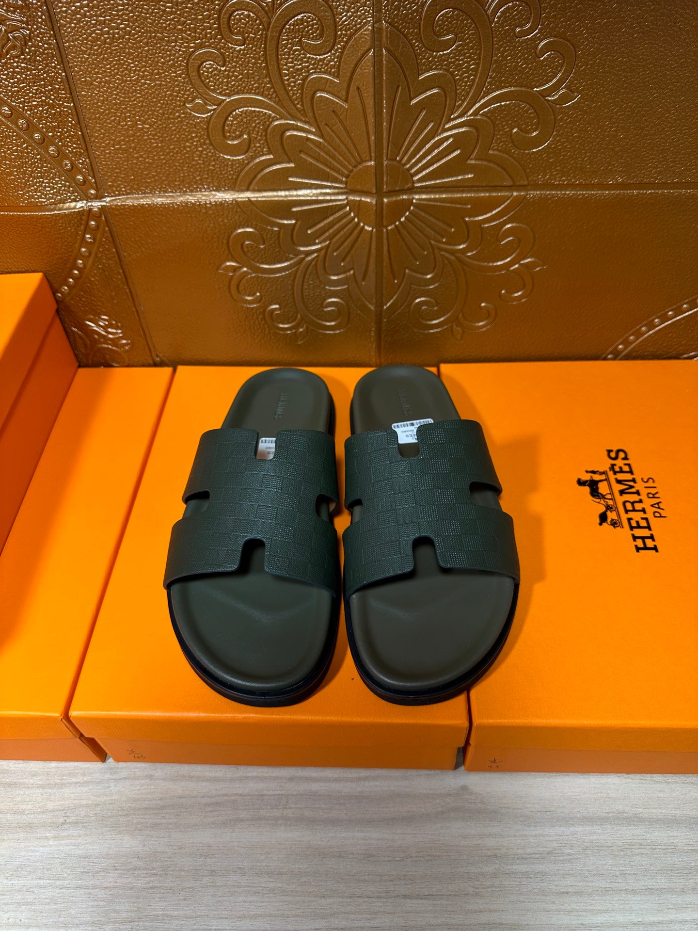 Hermes slide sandals, dark green wide strap and textured footbed, pair on box