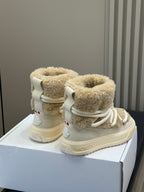 Moncler ankle boots in light tan with thick shearling lining and white drawstring laces