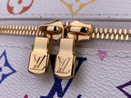 Louis Vuitton zipper pull with LV monogram on multicolor bag lining