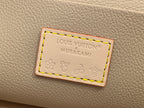 Louis Vuitton Murakami label on beige interior with stitched border