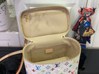 Louis Vuitton multicolor monogram bag with open top and beige interior