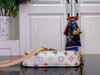 Multicolor monogram crossbody bag with curved top and beige strap connection