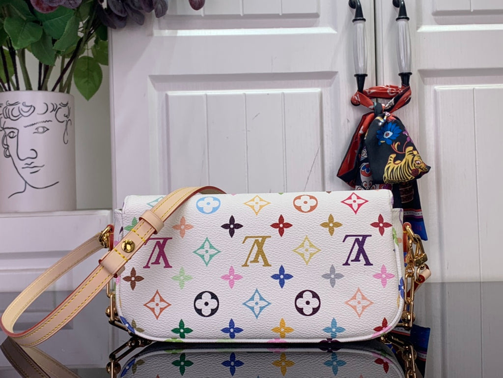 Multicolor monogram crossbody bag with gold-tone hardware and top flap detail