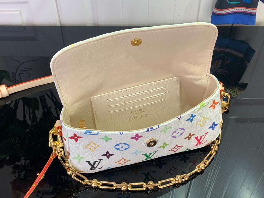 Multicolor monogram crossbody bag interior with white lining and inner pocket