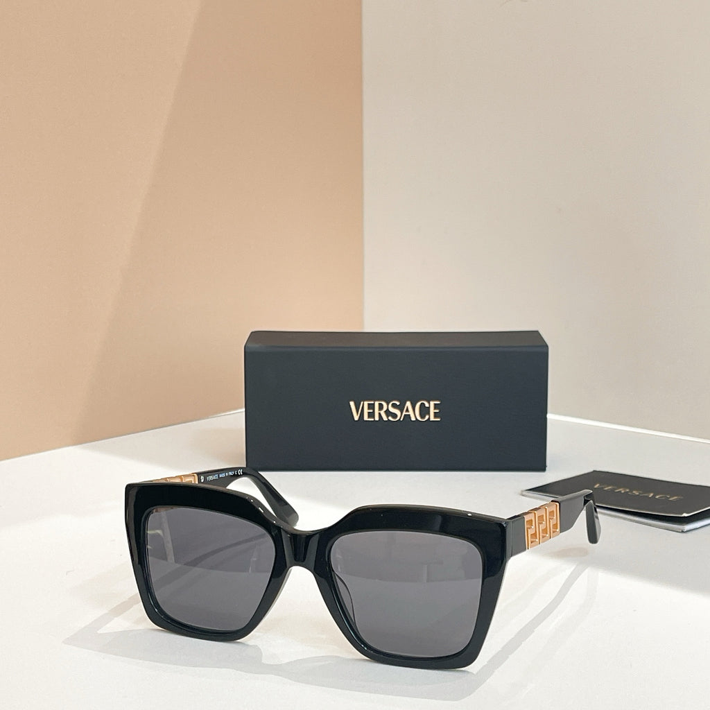 Dark navy square sunglasses with gray tinted lenses and broad temples