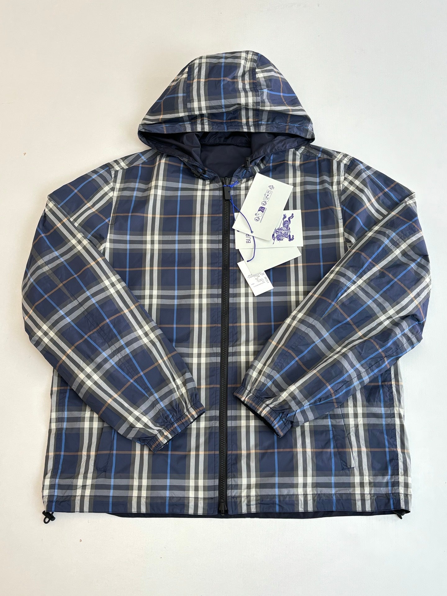 Burberry blue plaid hooded jacket with full zip and drawstring hood