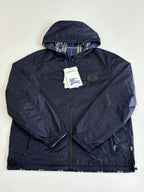 Burberry navy hooded jacket with full zip and round logo patch on chest