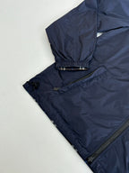 Burberry navy hooded jacket arm and hem close-up with ribbed cuffs and zip