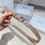 Tan leather belt with oval silver buckle and small crystal emblem