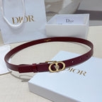Burgundy leather belt with gold-tone D buckle and crystal charm