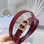 Burgundy leather belt with gold-tone buckle and round crystal charm
