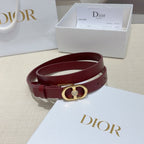 Burgundy leather belt with gold-tone buckle and crystal charm on strap