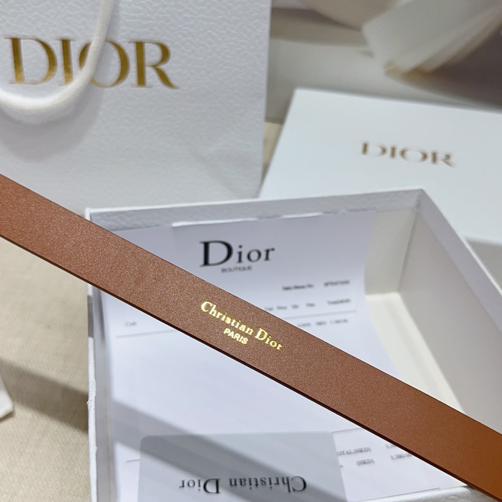 Tan leather belt strap with gold-tone 'Christian Dior Paris' engraving