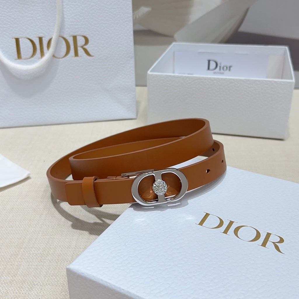 Tan leather belt with silver oval buckle and crystal charm
