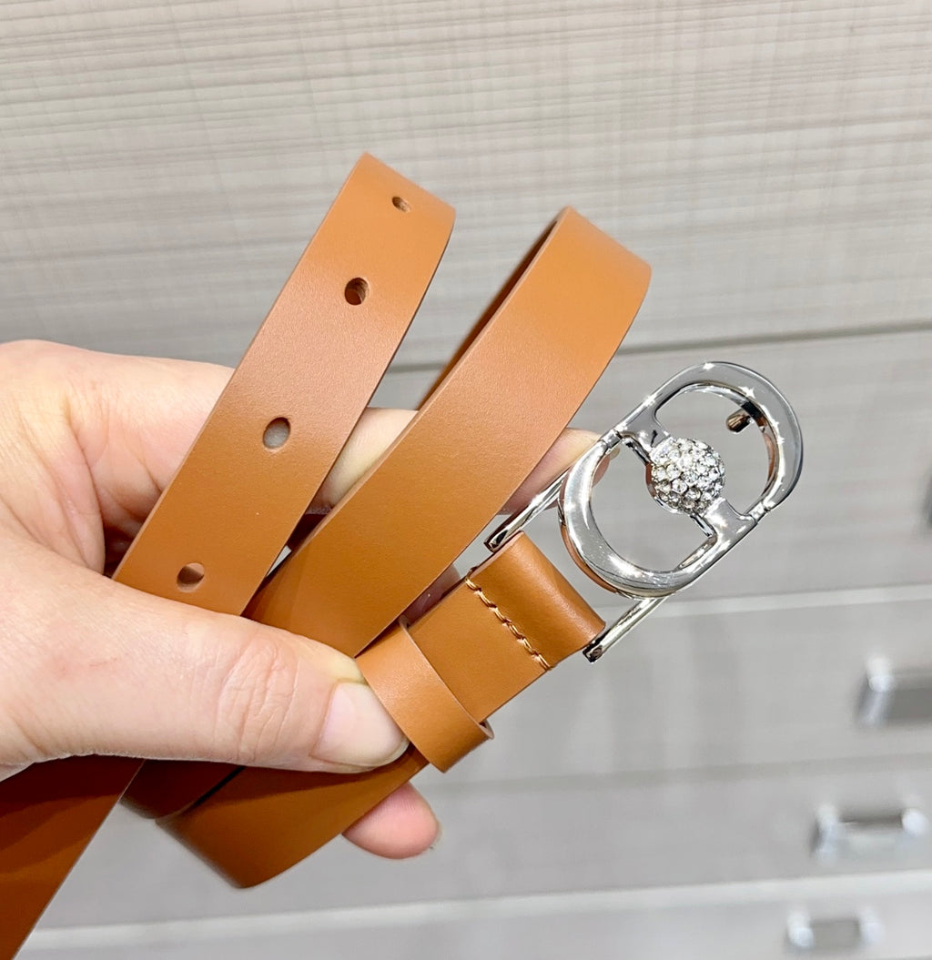 Tan leather belt with silver buckle and crystal O-ring charm