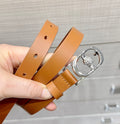 Tan leather belt with silver buckle and crystal O-ring charm