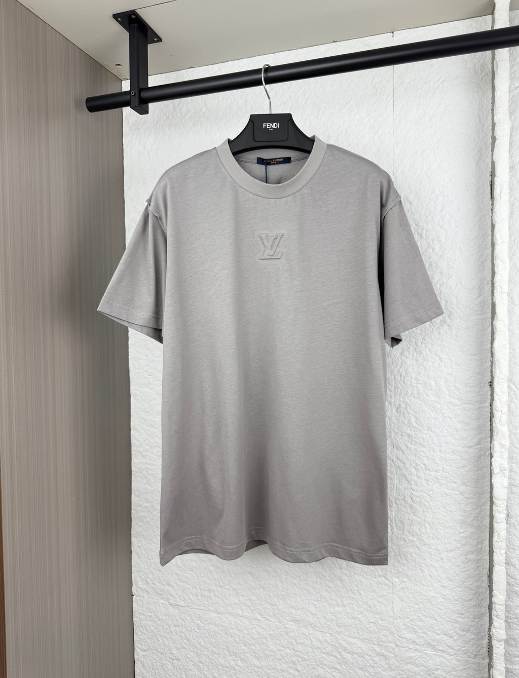 Louis Vuitton light gray short-sleeve T-shirt with LV emblem at chest