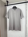 Louis Vuitton light gray short-sleeve T-shirt with LV emblem at chest
