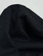 Black T-shirt with raised logo motif detail