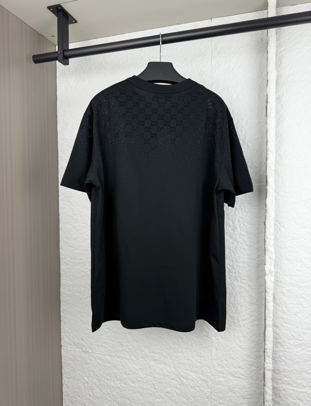 Black short-sleeve T-shirt, back view