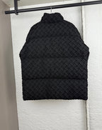 Black woven-texture hood with rounded shape