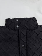 Black hood and front placket with metal snap buttons