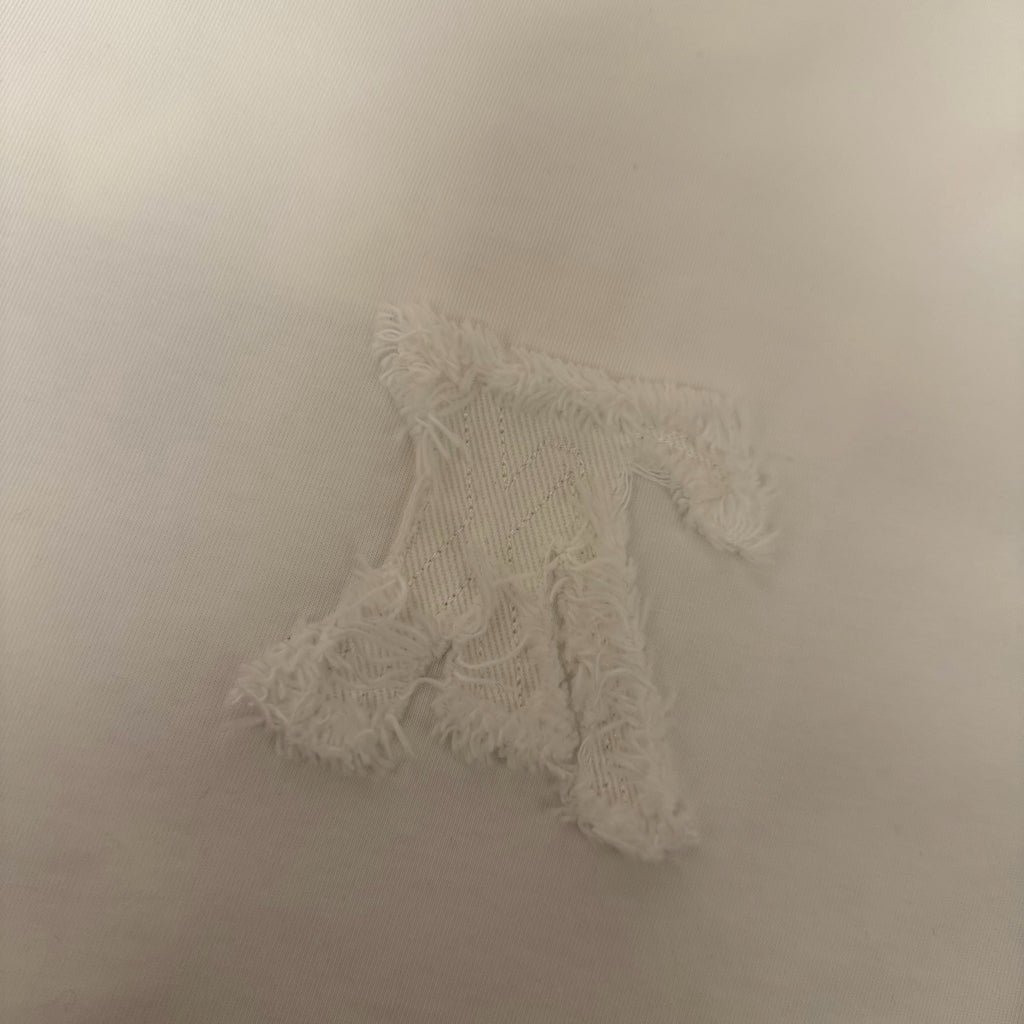 White T-shirt chest embroidered emblem detail