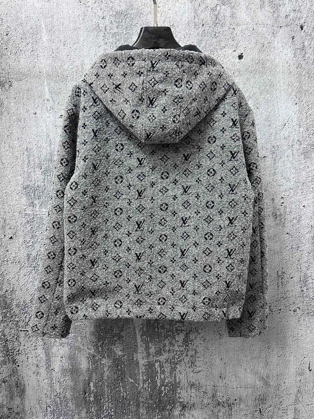 Louis Vuitton hooded full-zip jacket back view in dark gray with monogram pattern