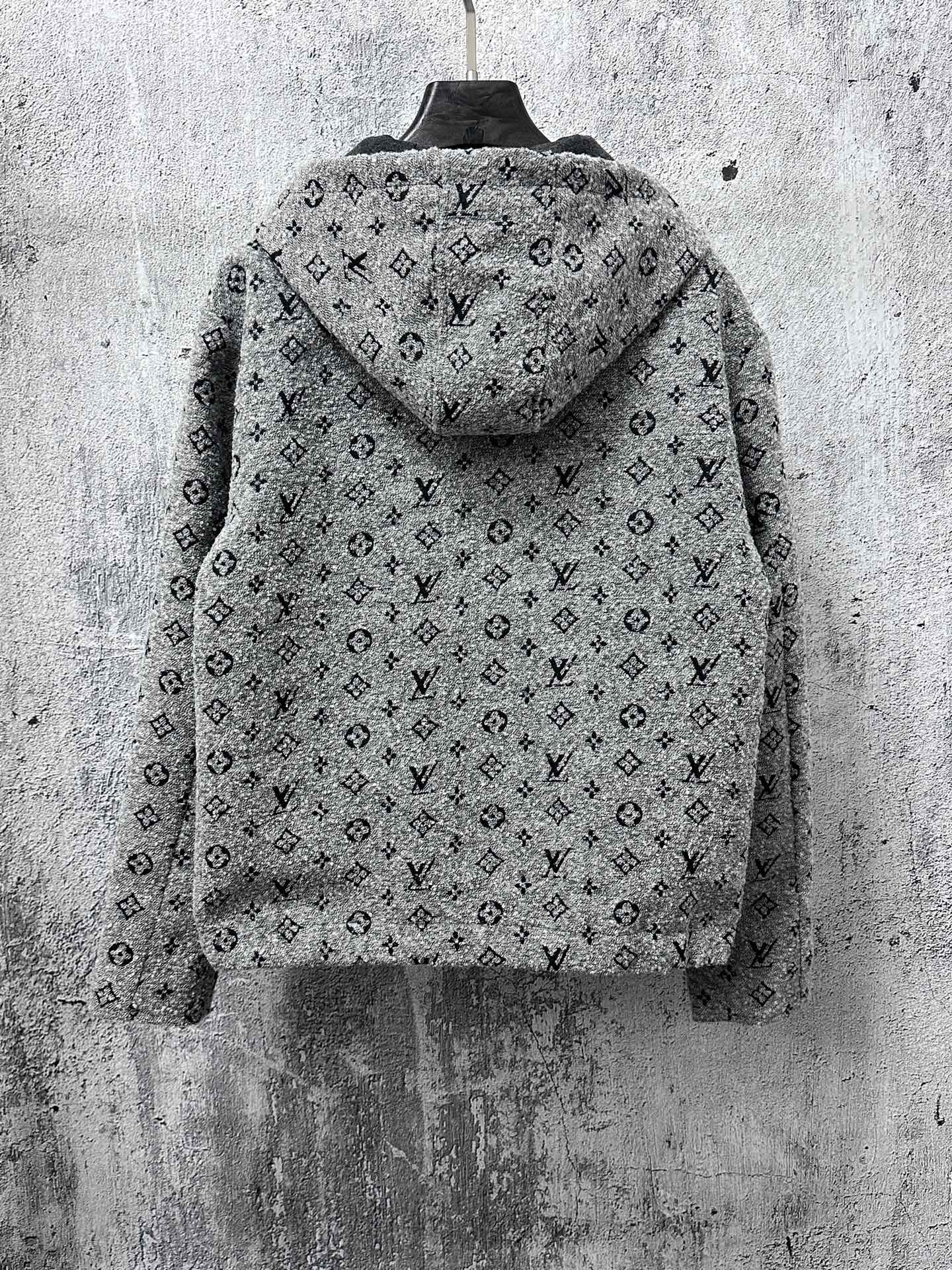 Louis Vuitton hooded full-zip jacket back view in dark gray with monogram pattern