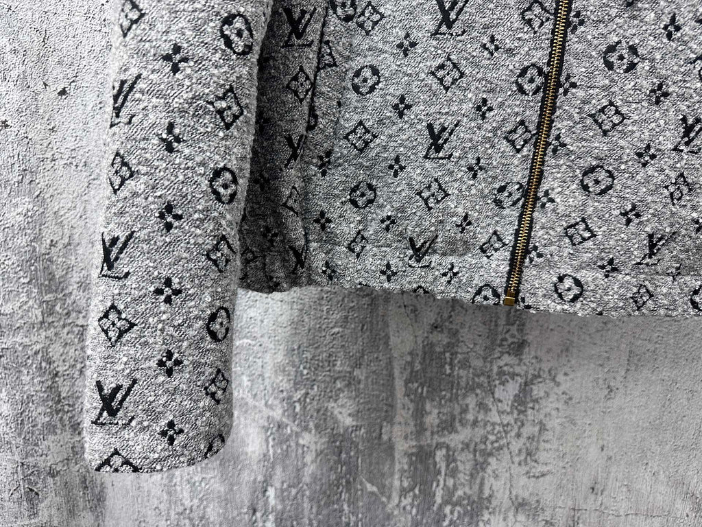 Louis Vuitton hooded jacket lower front close-up in dark gray with monogram and zipper