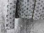 Louis Vuitton hooded jacket lower front close-up in dark gray with monogram and zipper