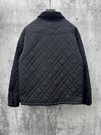 Burberry long quilted jacket, back view with raised logo and stand collar