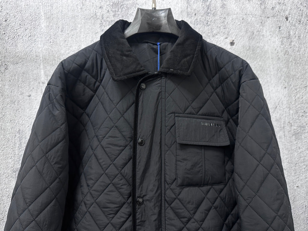 Burberry long quilted jacket front view with stand collar and button placket