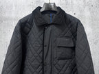 Burberry long quilted jacket front view with stand collar and button placket