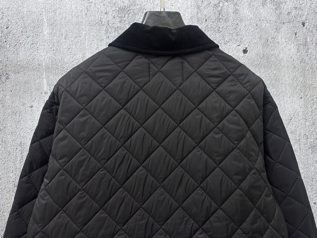 Prada quilted long jacket back in dark black with diamond stitched texture