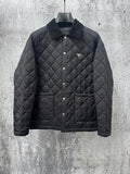 Prada quilted long jacket in dark black with snap buttons and stand collar