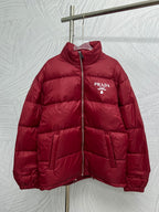 Prada red puffer jacket with front zipper and PRADA logo patch