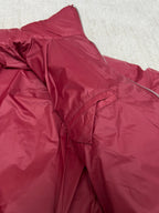 Prada red puffer jacket side seam with front zipper and quilted padding