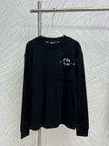Dark crewneck long-sleeve sweatshirt with chest pocket and white CD logo detail