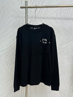 Dark crewneck long-sleeve sweatshirt with chest pocket and white CD logo detail