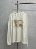 White long-sleeve shirt with gold horse graphic embroidery on the front