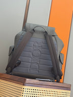 Gray Dior monogram backpack back panel with padded adjustable shoulder straps