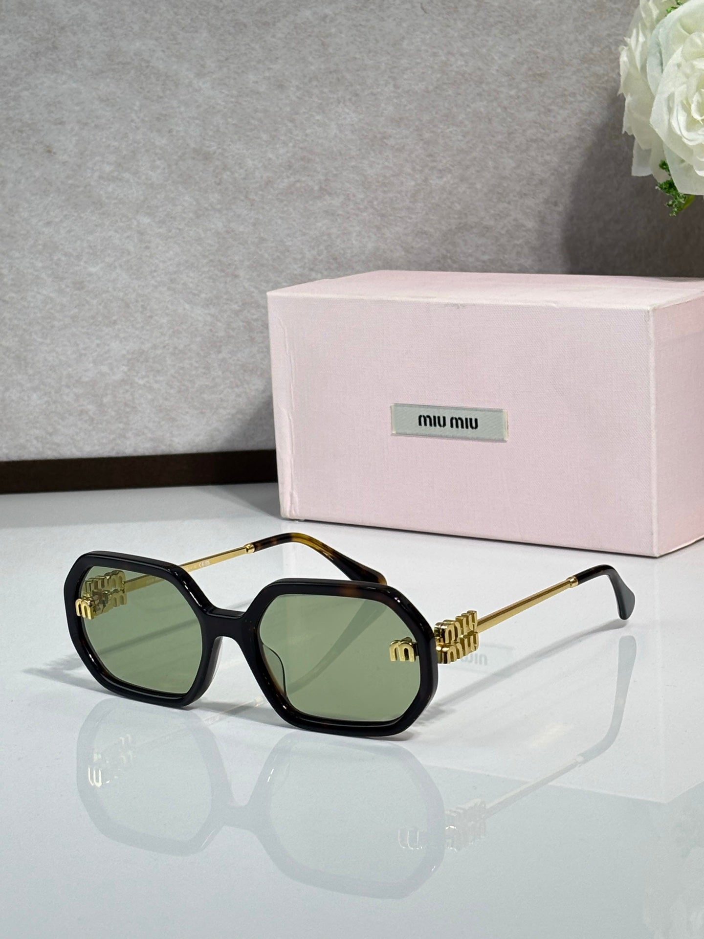 MiuMiu Glasses