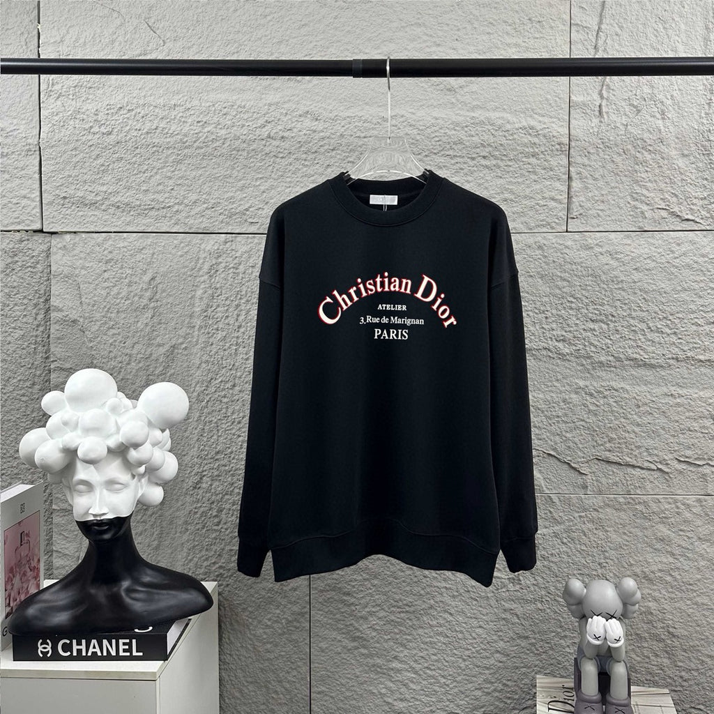Black crew-neck sweatshirt with long sleeves and centered Christian Dior logo graphic