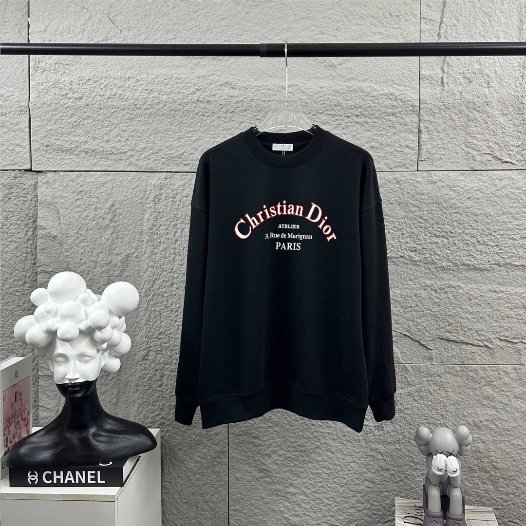 Black crew-neck sweatshirt with long sleeves and centered Christian Dior logo graphic