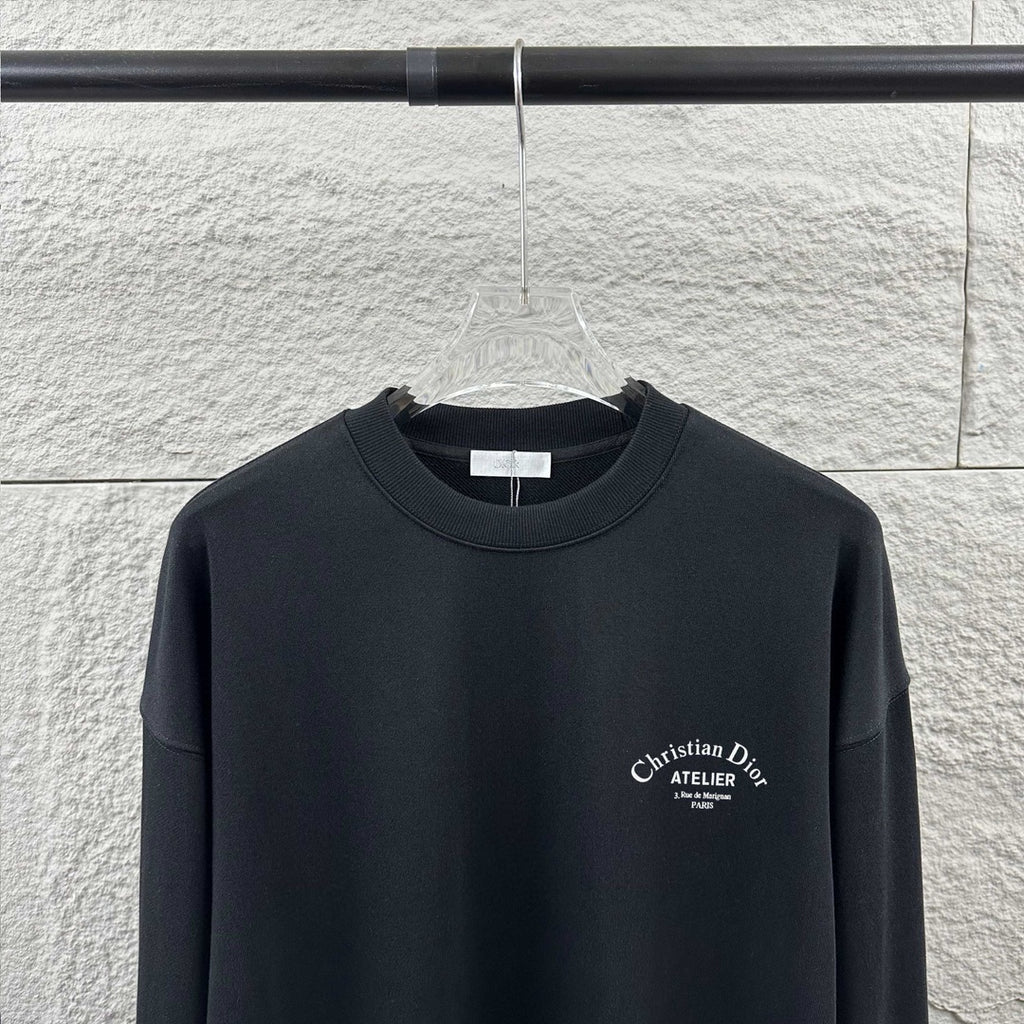 Dark long-sleeve crewneck sweatshirt with Christian Dior Atelier logo on chest